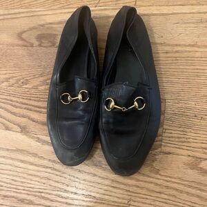 Gucci Black Loafers with Gold Buckle Detail
